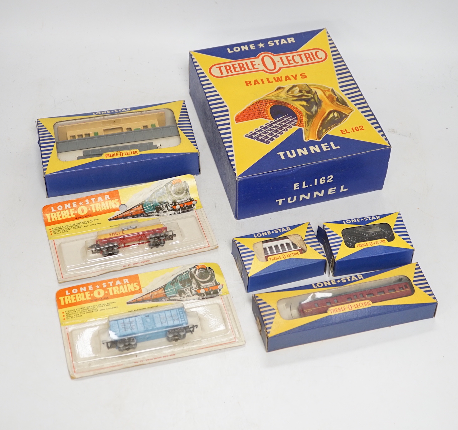 Sixty-two boxed items of Lone Star 000 gauge model railway including; a tunnel, Brake End Coaches, bogie wagons, station platforms, platform extensions, signal boxes, box vans, and telegraph poles